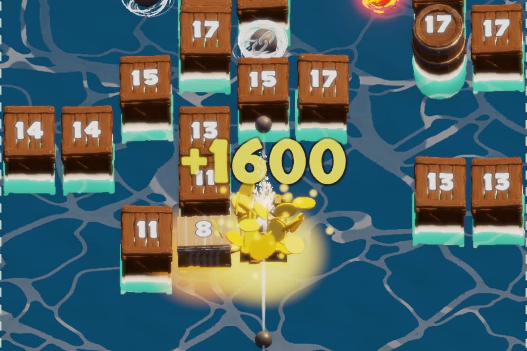 A gold treasure chest bursting open in a shower of coins worth 1,600 points between numbered crates and a barrel